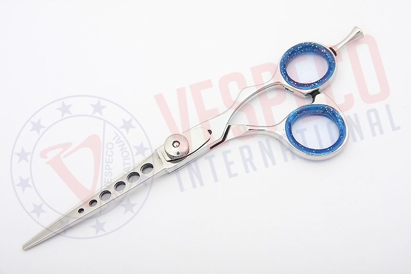 Scissors with holes